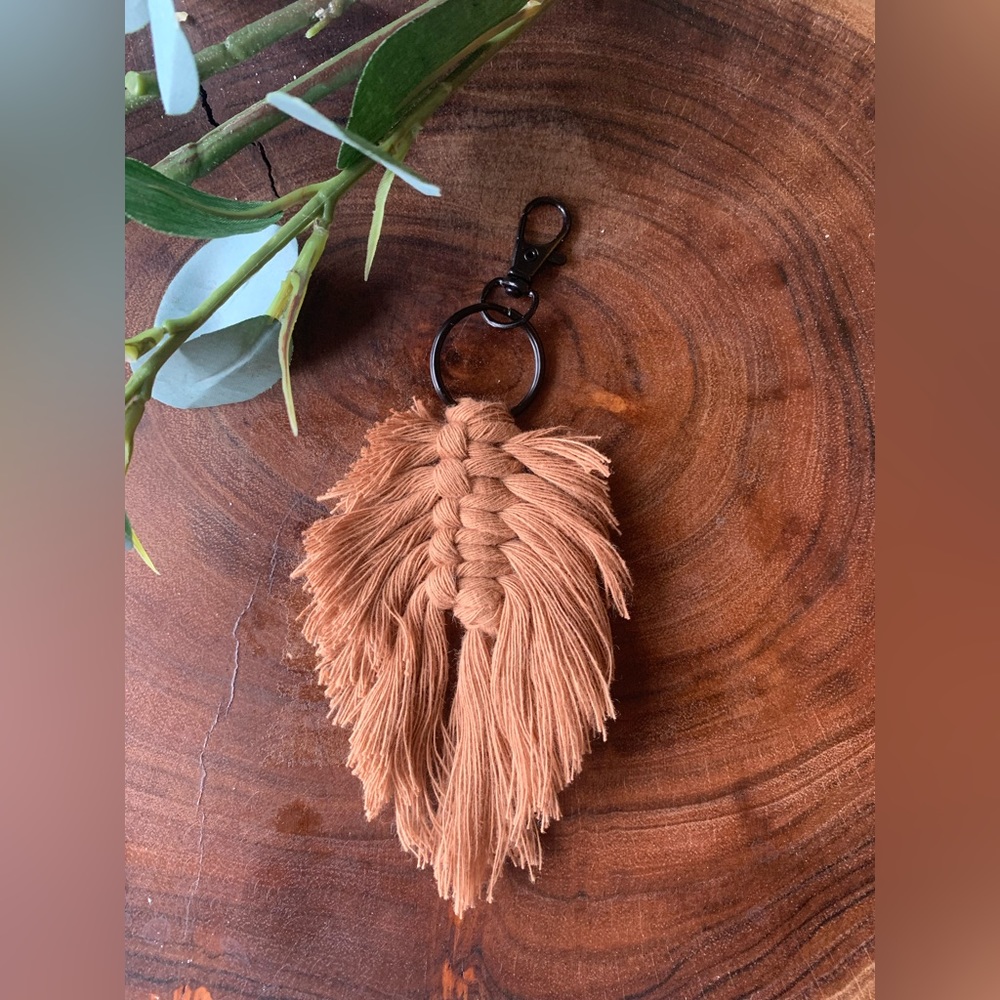 Orangish red macramé feather keychain